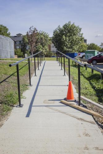 New connection access ramp to city park and pathway.